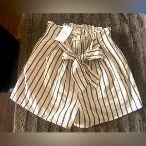 Luminary Size Small striped shorts.Cute bow detail. Never worn.Perfect condition